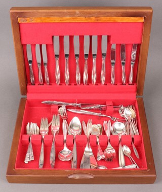 A quantity of Community Plate silver plated flatware contained in an oak finished canteen 