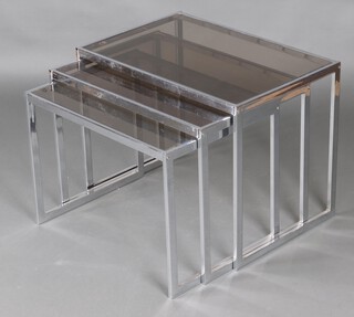 A mid-century nest of 3 chrome and smoked glass coffee tables 48cm h x 63cm w x 42cm d 
