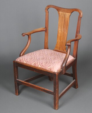 A Georgian bleached mahogany slat back open arm chair, raised on square supports with box framed stretcher and upholstered drop in seat 92cm h x 60cm w x 50cm d (old repair to crest) 