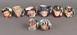 Eight Royal Doulton character jugs - The Sherlock, The Poacher, Gladiator, Rip Van Winkle, Aramis, Town Cryer, The Falconer and Robin Hood 