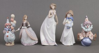 A Lladro figure of a lady Afternoon Promenade 7636 24cm (parasol missing), a Lladro figure 5211 (parasol missing) 13cm, 2 Lladro figures of clowns Littlest Clown 5811 and Having a Ball 5813 together with a Nao figure of a standing girl with doll 
