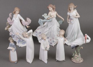 A Lladro figure of a standing lady Spring Splendour 5898 30cm, ditto Summer Serenade 6193 30cm and a figure of a young lady collecting flowers - Treasures of The Earth 6921 32cm (all 3 figures are damaged and repaired) and 5 other Lladro figures - stork 612, boy in nightgown, girl in nightgown, yawning boy and girl with pig 