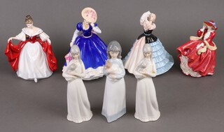A Royal Doulton figure Top O'The Hill, 3 Royal Doulton Figures of The Year - May, Susan, Sara together with a Nao figure of a standing girl and 2 others 