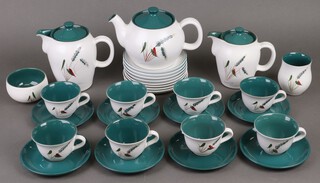 A Denby 39 piece Green Wheatsheaf pattern tea service comprising teapot, 2 hot water jugs, sugar bowl, small vase, 8 tea plates, 8 cups and saucers