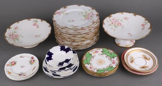 R Belinieres Limoges for Haynes and Company, a 13 piece dessert service comprising comport (cracked) and 12 plates (3 chipped), 3 Coalport blue and gilt decorated tea plates, 3 floral patterned Coalport tea plates, 1 cracked together with 3 decorative saucers 