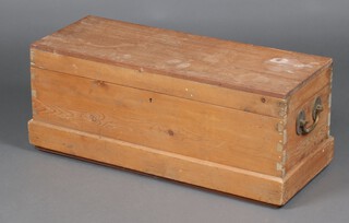 A pine and hardwood trunk with hinged lid and brass drop handles 37cm h x 91cm w x 35cm d (water marks in places) 