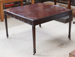 An Edwardian square Chippendale style library table with swag decoration on square tapered supports 77cm h x 121cm 