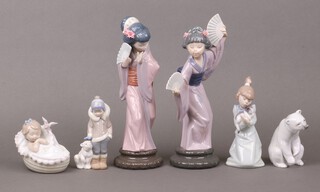 Three Lladro figures - polar bear, comforting dream and Timid Japanese (all boxed) together with 3 unboxed figures - Geisha girl with fan, figure of a girl 5712 and boy with polar bear 5238 