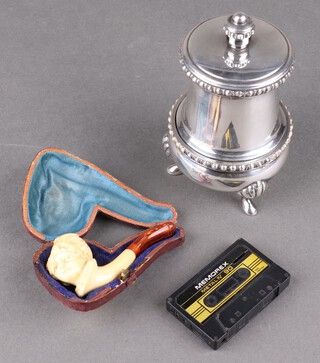 A novelty Ronson table lighter in the form of a Georgian condiment, a lighter in the form of a cassette and a cheroot holder