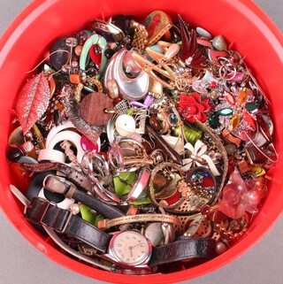 A quantity of various earrings and wristwatches
