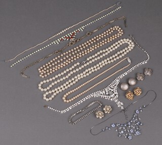 A collection of costume jewellery including a diamonte bracelet, bead necklaces, etc 