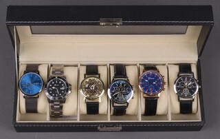 Six gentleman's fashion wristwatches contained in a presentation display box 