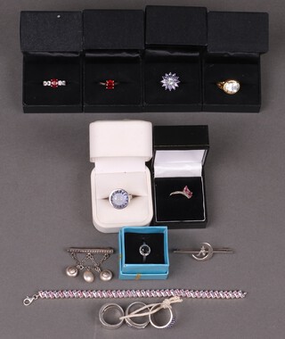 Nine ladies 925 silver dress rings together with a collection of other silver items of costume jewellery including pendants, brooches etc 
