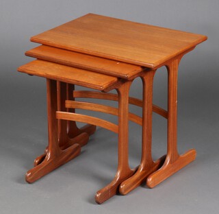 A mid-century nest of 3 rectangular teak coffee tables 