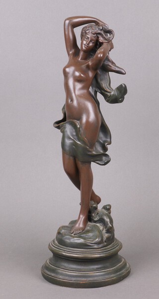 A bronzed figure of a standing lady 43cm 