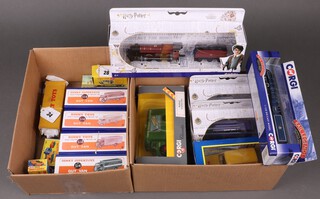 A collection of Corgi and reproduction Dinky toys to include Harry Potter Hogwarts trains, flying Ford Anglia and The Knight Bus, Dinky Toys 514 Guy Van (x4) etc 
