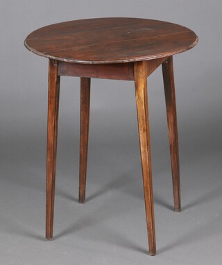 A 19th Century circular elm occasional table raised on square supports 72cm h x 61cm diam. 