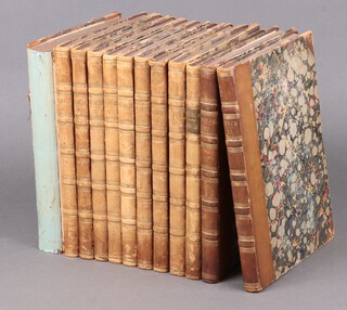 Twelve half leather bound editions of Punch (1 with damage to spine) 