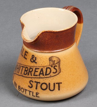 A Royal Doulton brown glazed Whitbread's Ale & Stout advertising jug, impressed to base 3344 661 11cm