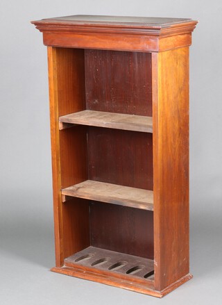 A mahogany gun cabinet with moulded cornice converted to a bookcase fitted 3 shelves 128cm h x 74cm w x 34cm d 