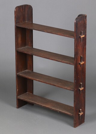 An Edwardian rectangular oak 4 tier bookcase 90cm h x 63cm w x 14cm d 