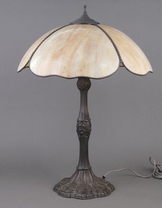 A Liberty style embossed metal table lamp with opaque shade 63cm (this lamps has failed an electrical PAT test and would require rewiring, to be sold for decorative purposes only)
