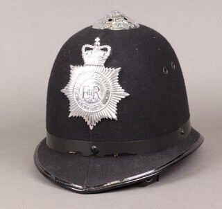 An Elizabeth II Metropolitan Police, police constable's helmet 