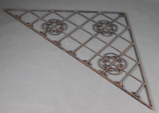 A pierced wrought iron apex shaped panel 104cm x 206cm 