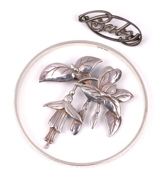 A silver brooch in the form of fuchsia, a silver brooch marked baby and a silver bangle, 83 grams 