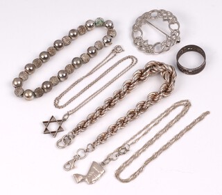 A silver multi link bracelet 20cm, a silver Star of David pendant hung on a fine silver chain 18 grams and a small quantity of costume jewellery 