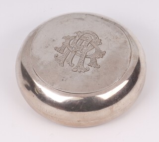 A circular silver tobacco box with inscription to lid, Birmingham 1907, makers mark EC, 78.4 grams 