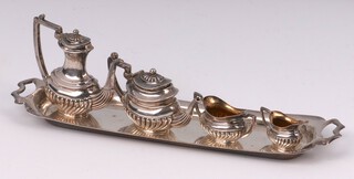 An Edwardian silver miniature 5 piece tea/coffee service comprising teapot, coffee pot, twin handled sugar bowl, cream jug and tray, Birmingham 1905, by Samuel M Levi, 34 grams 