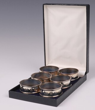 Six silver napkin rings London 2006 by JAH, 79 grams, boxed 