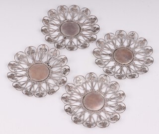 Four Continental pierced silver flower head shaped dishes 141 grams