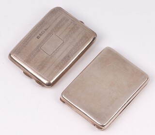A silver match slip Birmingham 1921 by William Base & Sons together with an engraved silver vesta case Chester 1924, marks rubbed, 62.4 grams 