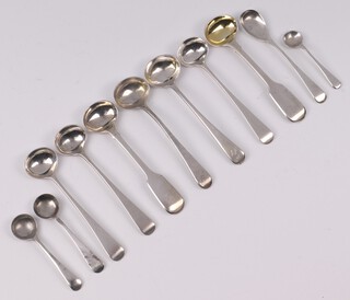 Three George III silver Old English mustard spoons London 1804, 2 similar mustard spoons (marks rubbed), a pair of William IV silver fiddle pattern mustard spoons London 1834 together with 4 Old English pattern silver salt spoons, 97 grams 