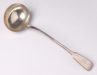 A Victorian silver fiddle pattern soup ladle with armorial bird, London 1849 by Henry Holland, 248 grams 