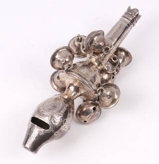 A 19th Century engraved silver rattle with whistle and 8 bells, marks rubbed, 55 grams gross 
