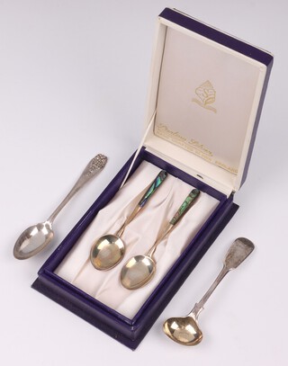 A Victorian silver fiddle pattern mustard spoon Birmingham 1899, a Victorian silver coffee spoon London 1862 together with 2 New Zealand Sterling silver spoons set abalone in a plush case 
