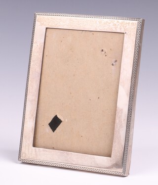 A Sterling silver easel photograph frame marked 18cm x 13cm