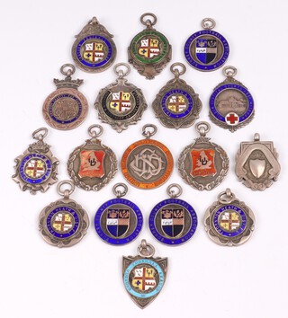 Seventeen various silver and enamelled sports medals, 180 grams gross 