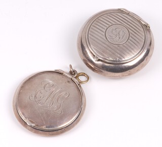 A circular miniature silver compact with engine turned decoration, Chester 1909, (dent to side), together with 1 other  Birmingham 1908, both monogrammed 