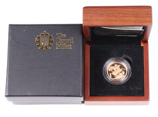 A 2013 Royal Mint gold proof sovereign, cased with COA
