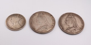Two Victorian silver crowns 1889 and 1892, together with a silver florin 1873