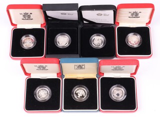 A collection of 4 Royal Mint Silver proof piedfort 1 pound coins (1993, 1998, 2006, 2006) together with 3 silver proof 1 pound coins (1987, 2008, 2009), all boxed with COA