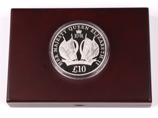An Elizabeth II 999 silver proof 10 pound coin 2016 'Her Majesty The Queens 90th birthday', 5 oz , mint sealed, contained in fitted case with COA and card slip case. 379 of 450 