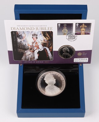 An Elizabeth II 999 silver proof 10 pound coin 2012 'The Queens Diamond Jubilee', 5 oz , mint sealed, contained in fitted blue presentation case with COA. 1050 of 1952 