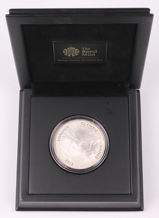 An Elizabeth II 999 silver proof 10 pound coin 2012 'The official London 2012 5oz coin', 5 oz, mint sealed, contained in fitted presentation case with COA.