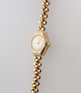 A lady's Vertex Revue wristwatch contained in a 9ct gold case, the movement marked Swiss Vertex 85 Revue, the case no.52953 970363, 13.3 grams excluding movement but including glass 