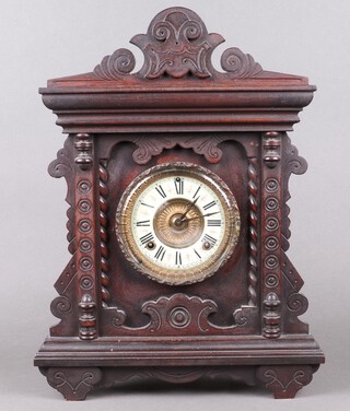 Ansonia, an American 8 day shelf clock with 12cm dial contained in a carved beech case, 17cm h x 35cm w x 12 cm d